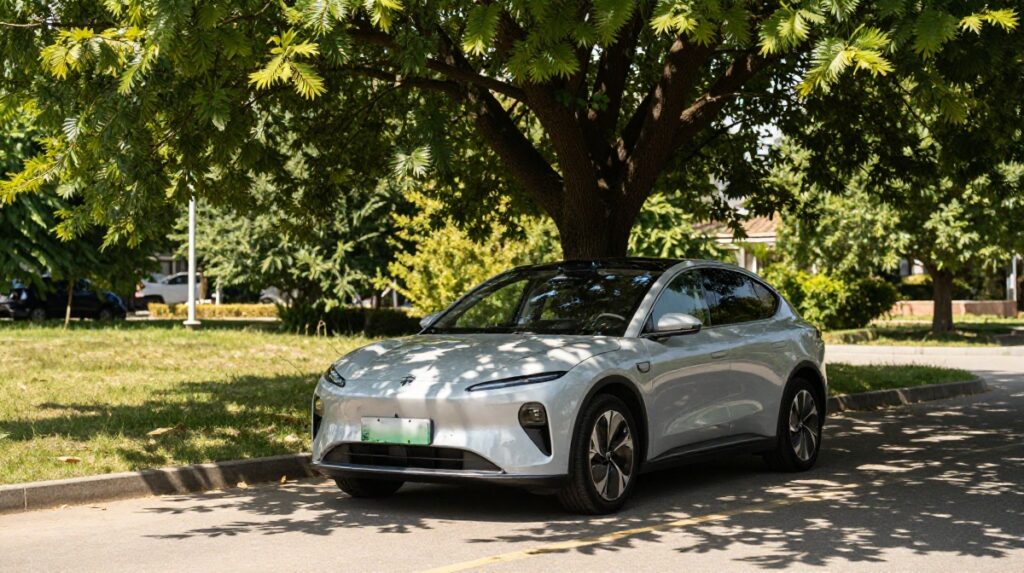 Electric car parked under a shady tree on a sunny summer day