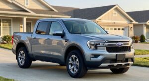 2026 Ford Maverick Hybrid pickup truck parked outdoors, front three-quarter view