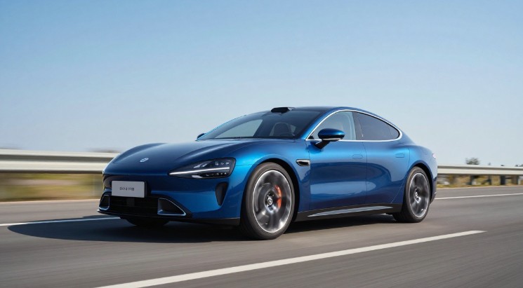 Lucid Air Sapphire driving on an open road, performance electric sedan"