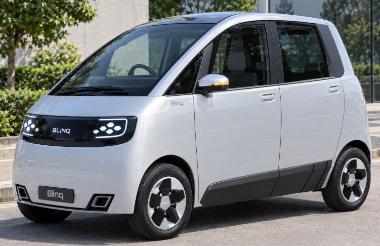 Blinq Ryde 4 lakh electric car, India's EV, parked on a city street